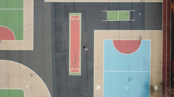 What strategies can be used to introduce alternative sports to UK schools?